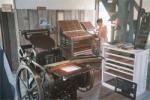 A photo of The Homestead Print Shop that shows various printmaking tools.