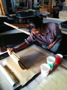 Radha Pandey working on a print