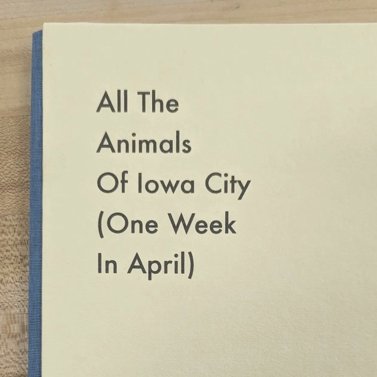 A book titled 'All The Animals Of Iowa City'