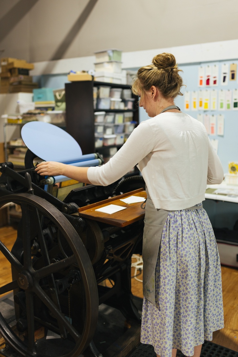 Kim Obee letterpress printing with a platen press.
