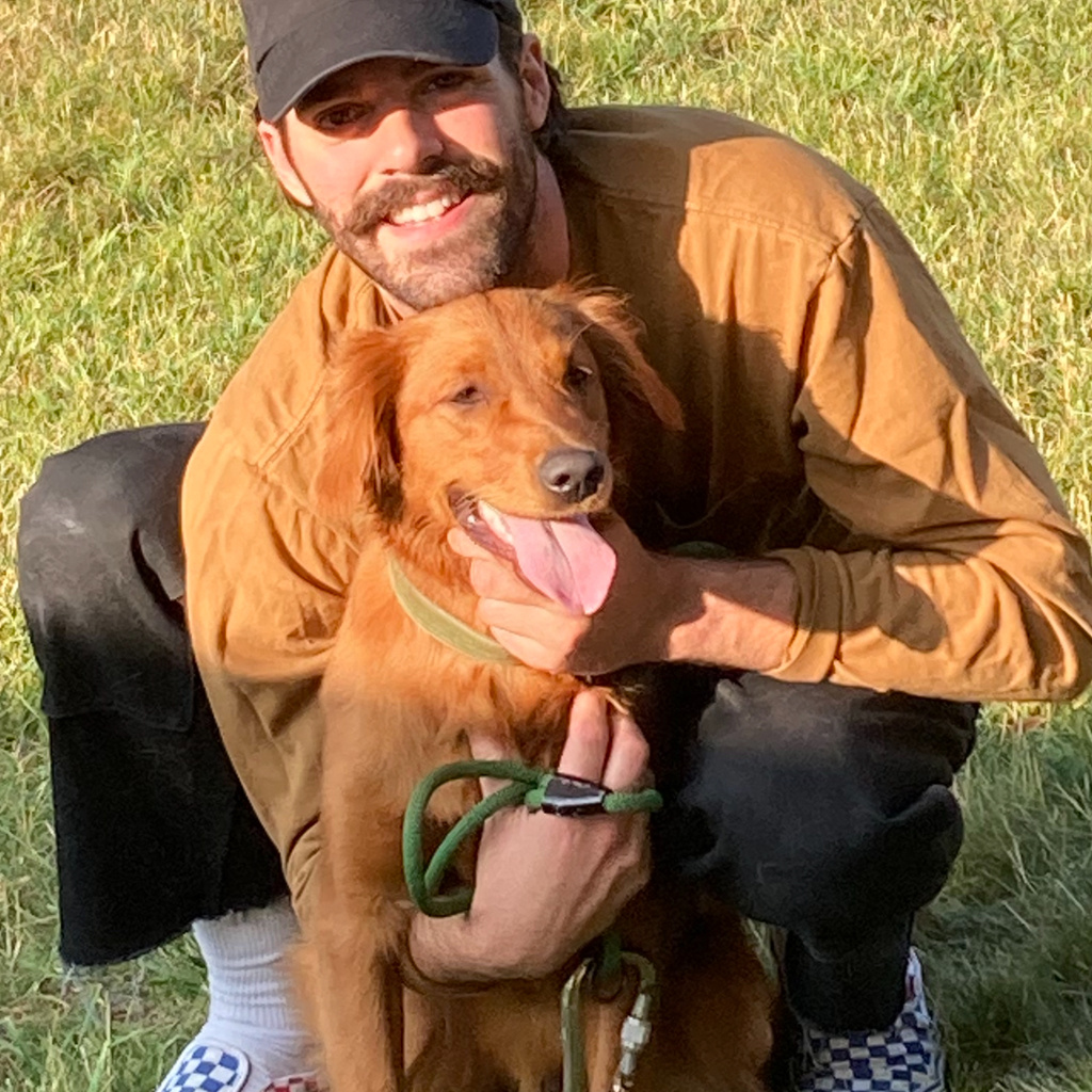 Image of Tyler Lofton and his dog Lottie
