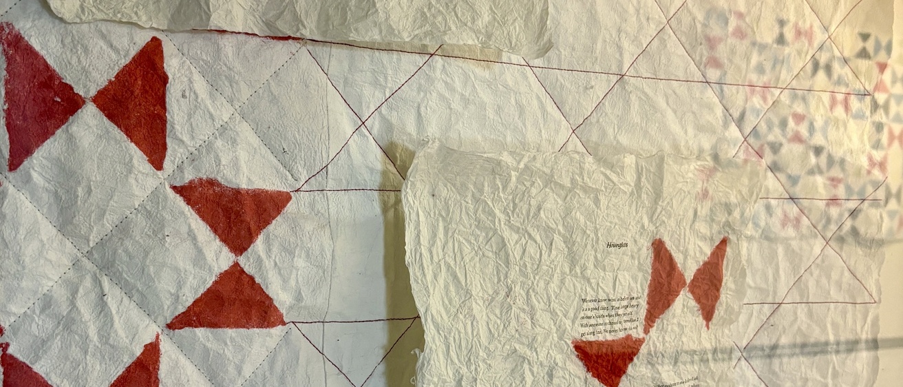 photo of a handmade paper quilt