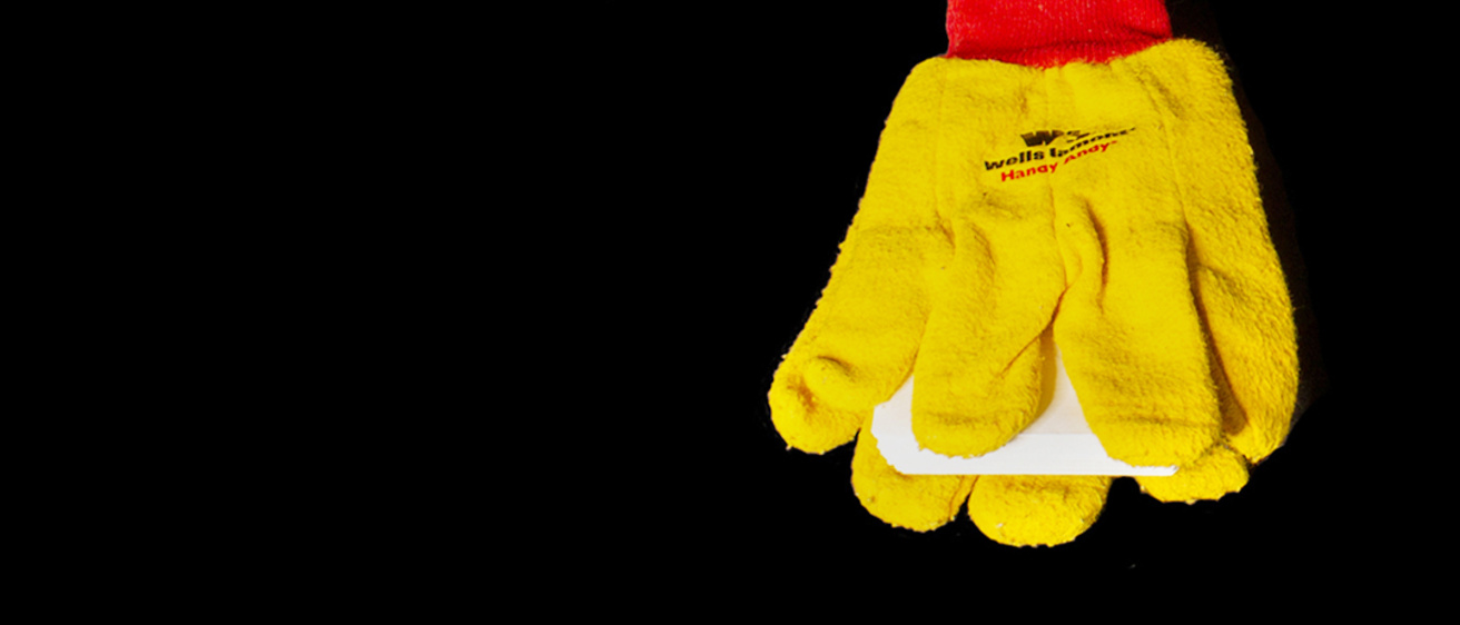 A book with gloves as cover