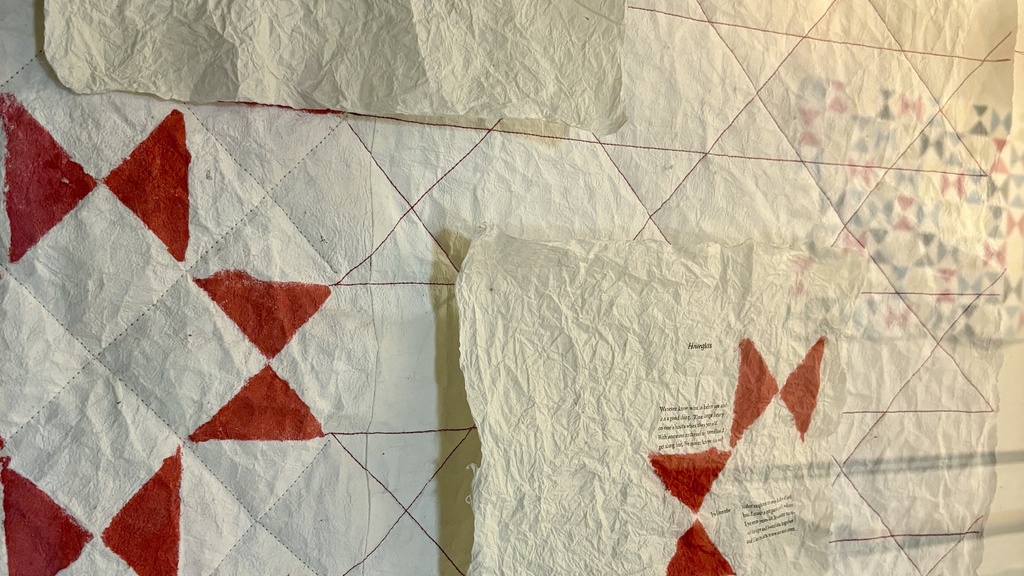 photo of a handmade paper quilt